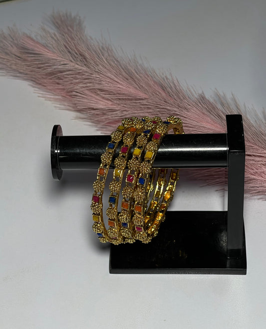 Radiant Gold Bangles with Multicolor Gemstones